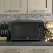 GE 1.6 Cu. Ft. 1,150-watt Countertop Microwave Oven + 2 Year Protection Pack