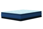 Queen hybrid mattress, light blue quilted top, royal blue wave-pattern sides, black low-profile foundation.